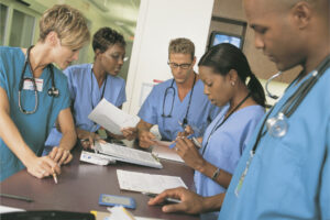 Image of male and female multi-ethnics physicians. Physicians Can Improve Their Marketing Campaigns.