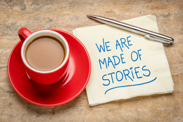 image of a coffee cup and pin with a message about storytelling in digital marketing